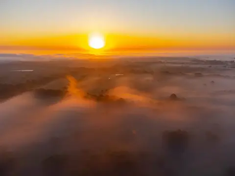 Aerial sunrise over the Danube Delta