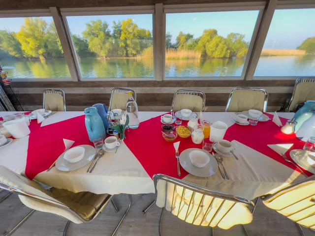 Breakfast with Danube Delta canal views on the Ibis Tours floating hotel