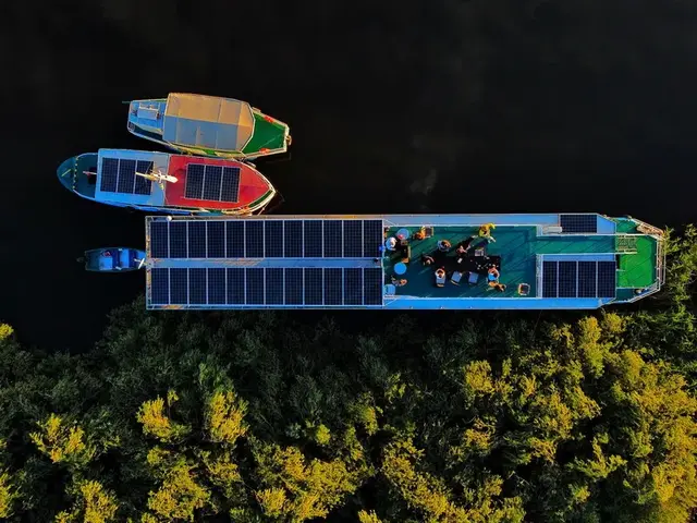 Ibis Tours floating hotel cruising through a Danube Delta channel